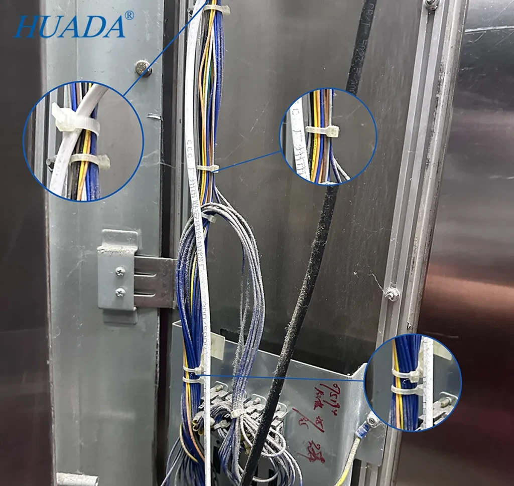 尼龙扎带分段固定电梯按钮面板背后的竖向线束